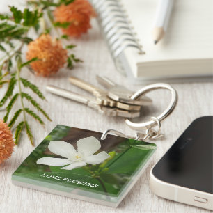 Llavero Keychain acrílico con una flor agradable