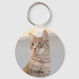Llavero Keychain de la montaña rusa de piedra con un símbo