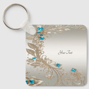 Llavero Keychain de las piedras azules de oro embellecidas