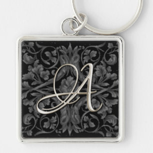 Llavero Keychain del Renacimiento Negro Inicial Plateado