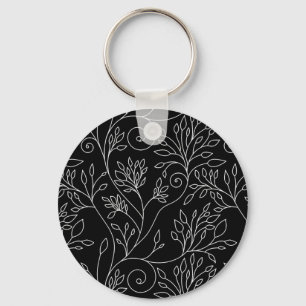 Llavero Keychain floral blanca y negra