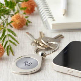 Llavero Keychain metálico plateado