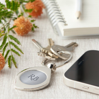 Llavero Keychain metálico plateado