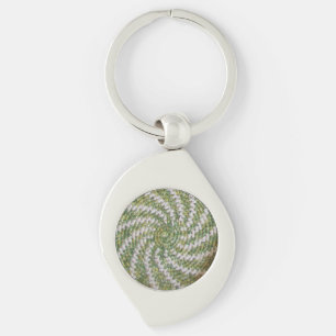 Llavero Keychain (metalizado) - Espiral blanca sobre el ve