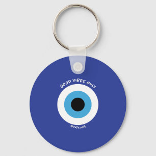Llavero Keychain Sólo Viajes Buenos Ojos Malvados