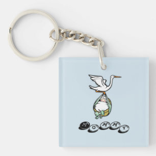 Llavero La cigüeña lleva a un niño bebé