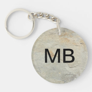 Llavero La clave monográfica masculina se ve en piedra
