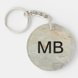 Llavero La clave monográfica masculina se ve en piedra