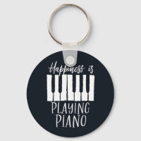 La felicidad pianista inspiradora juega al piano