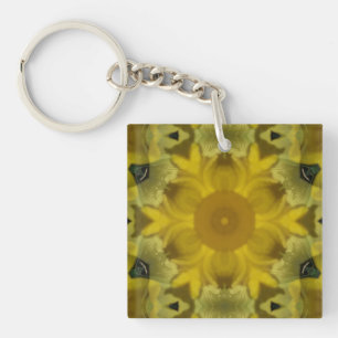 Llavero La flor del sol estalla dorada