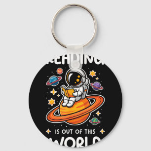 Llavero La lectura es un libro de espacio de astronauta fu