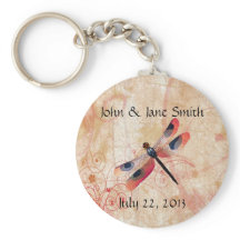 La libélula florece la cadena de claves favorita d