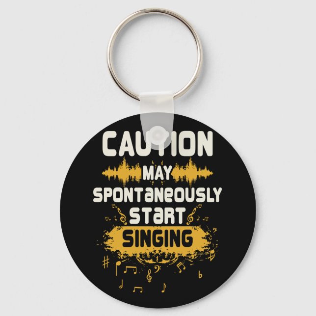 Llavero La precaución puede empezar a cantar música de man (Anverso)