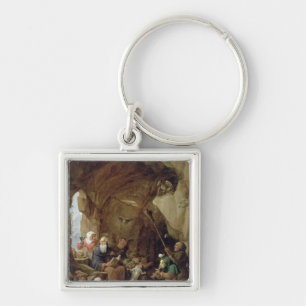 Llavero La tentación de St Anthony en una caverna rocosa
