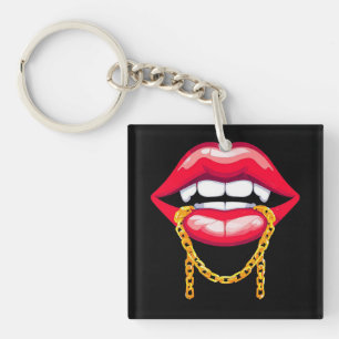 Llavero Labios rojos mordiendo una cadena dorada elegante