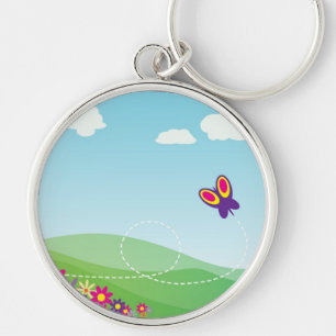 LLAVERO LADO DE COLINA CON MARIPOSA Y FLORES
