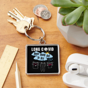 Llavero LARGA COVID - Se Ha Sido Colgado A Secar