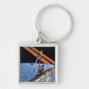 Llavero Las alas del panel de Canadarm2 y del arsenal