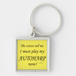 Llavero Las voces de autoharp dicen que deben jugar