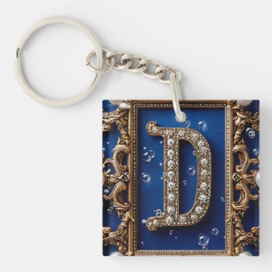 Llavero Letra D dorada ornamentada con joyas