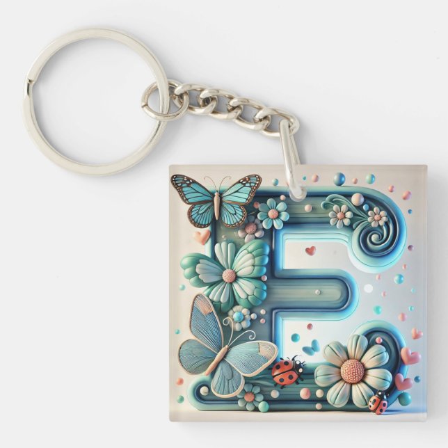 Llavero 🦋 Letra Floral E Mariposa Accesorio 🌸 (Frente)
