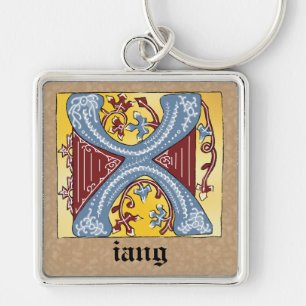 Llavero Letra medieval azul y marfil rojo con iluminación
