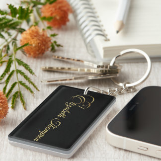 Llavero Letra monograma E Caballo en color oro