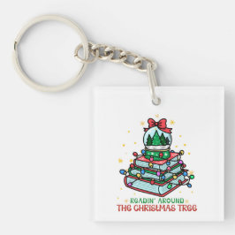 Llavero Leyendo alrededor del árbol de Navidad libresco