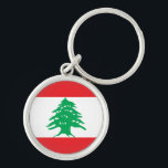 Llavero Líbano<br><div class="desc">Bandera de Líbano. La bandera de Líbano (árabe: el علملبنان) se forma de dos rayas rojas horizontales que envuelven una raya blanca horizontal. El cedro verde en el centro toca cada uno de las rayas rojas y su anchura es una mitad de la anchura de la bandera. Fue diseñada para...</div>