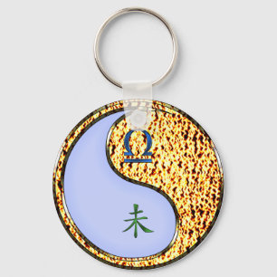 Llavero Libra y Gota de Fuego