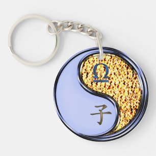 Llavero Libra y Rata de Fuego