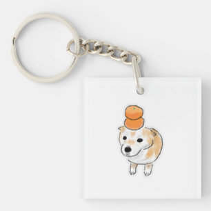 Llavero Lindo perro Shiba con mandarinas naranjas en la ca