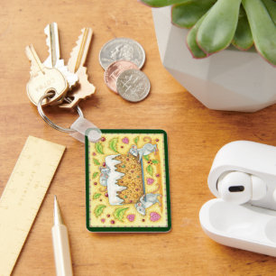 Llavero Lindos ratones de Navidad llevando un postre de pa