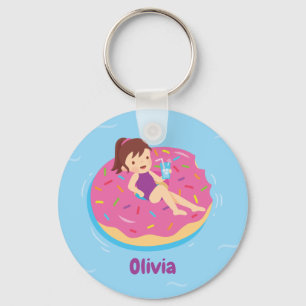 Llavero Llaverito de niña linda en flotador de piscina de 