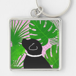 Llavero Llaverito de perro negro de isla tropical verde