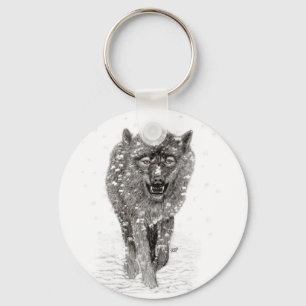 Llavero Lobo negro enojado en la nieve, invierno salvaje