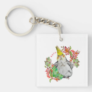 Llavero Loro de Corella en flores tropicales Baby Bodys