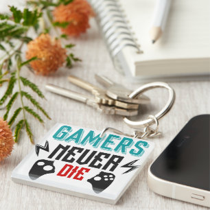Llavero Los jugadores nunca mueren de juego