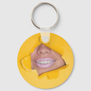 Llavero Los labios de la cara sonríen amarillo