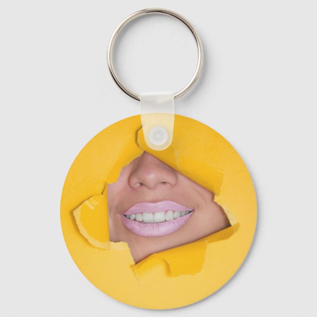 Llavero Los labios de la cara sonríen amarillo (Anverso)