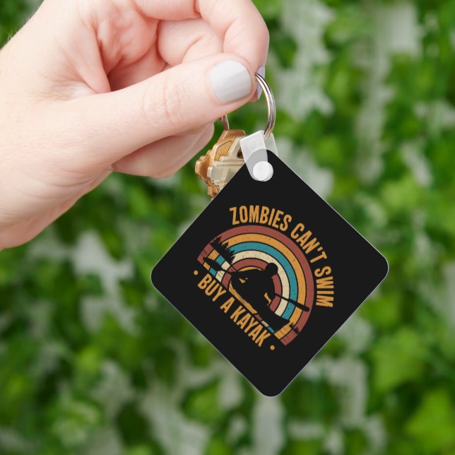 Llavero Los zombies no pueden nadar comprando un Kayak (Mano)