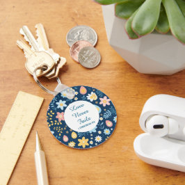 Llavero Love Never Fails Keychain