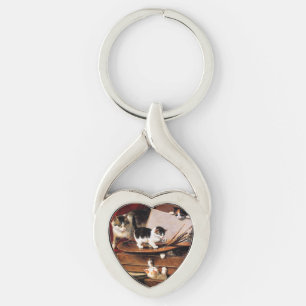 Llavero Madre gata y gatitos en la mesa