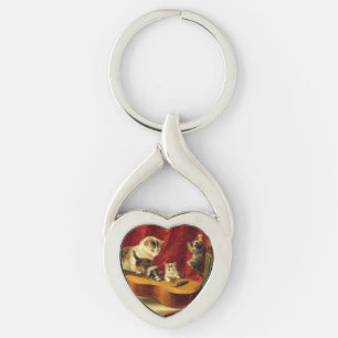 Llavero Madre gata y gatitos jugando con guitarra