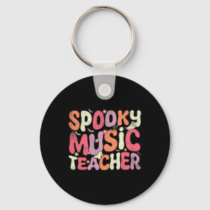 Llavero Maestra de Música de Halloween enseñando a un prof