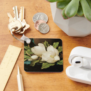 Llavero Magnolias Gigantes sobre un Paño de Terciopelo Azu