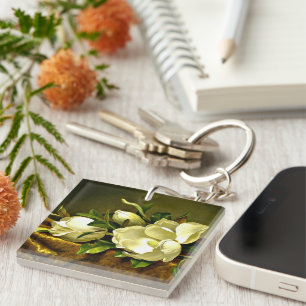 Llavero Magnolias sobre tela de terciopelo de oro