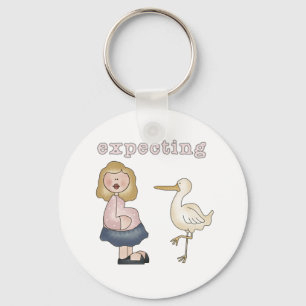 Llavero Mamá y cigüeña expectantes