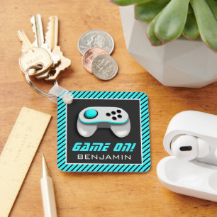 Llavero Mando de videojuego azul y blanco para habitación