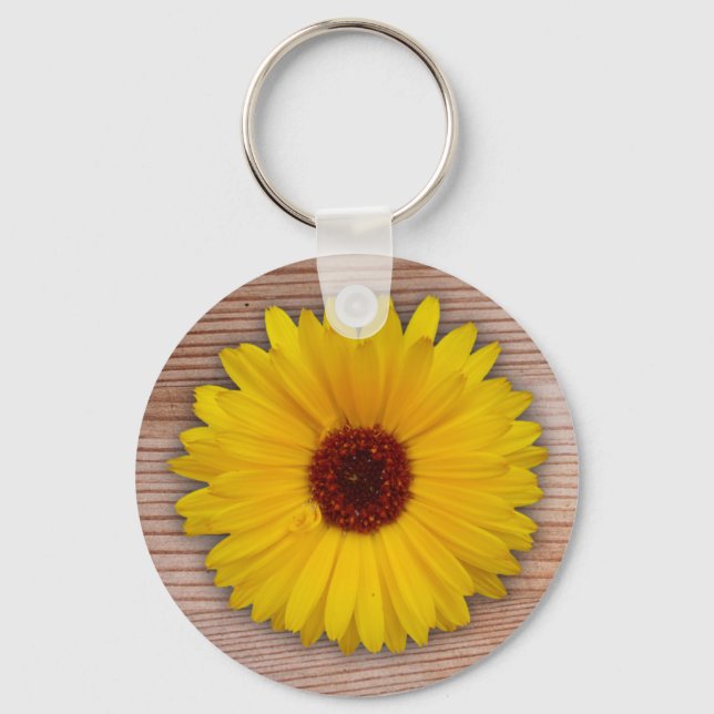 Llavero Marigold de girasol en tablas de madera rusas (Anverso)
